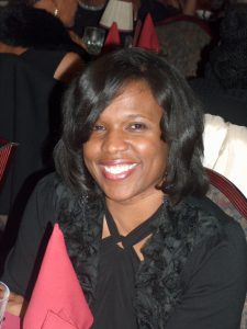 Coach CLaudette Taylor